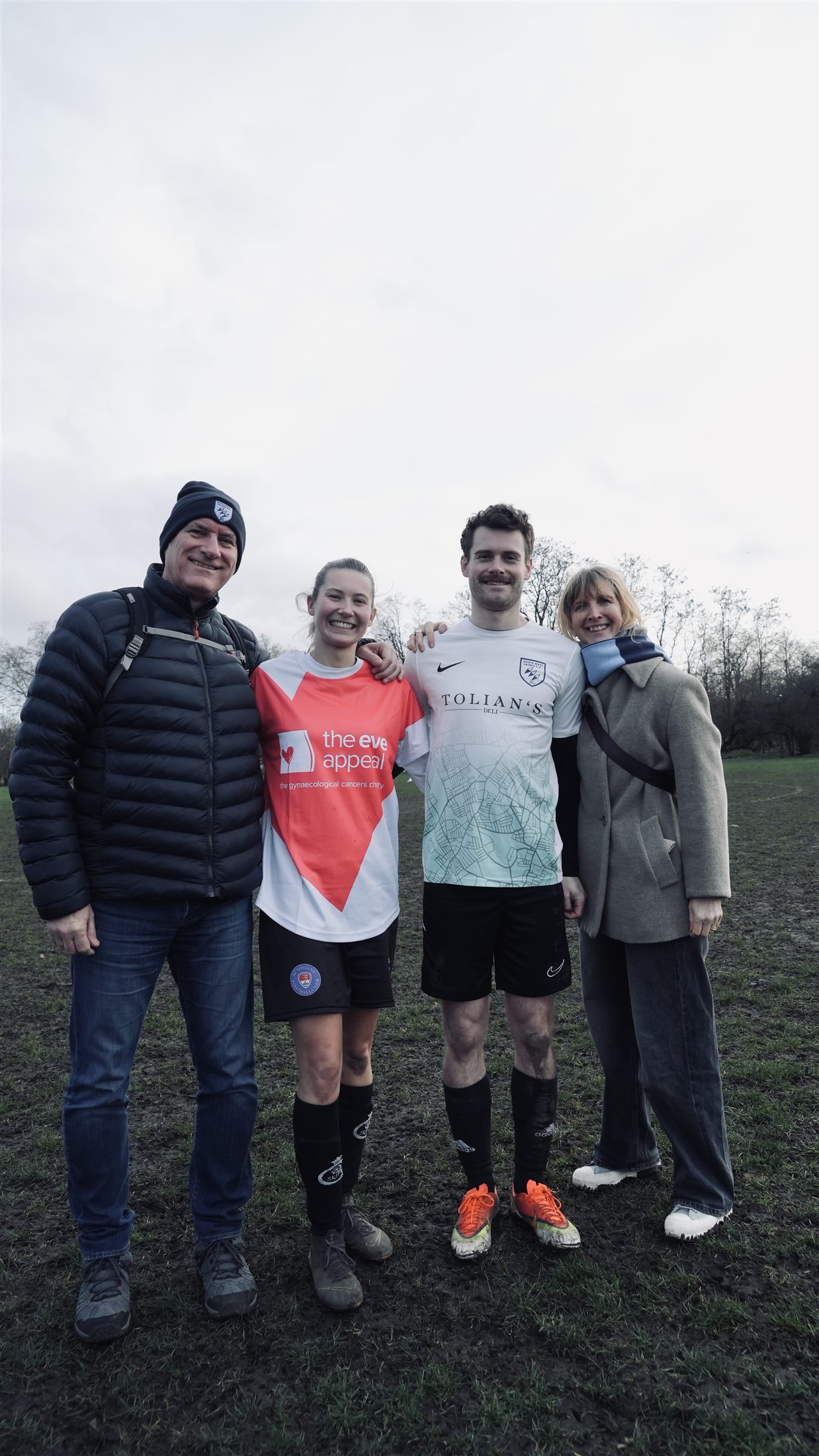 Saints and WAGs players pose with supporters after the charity match