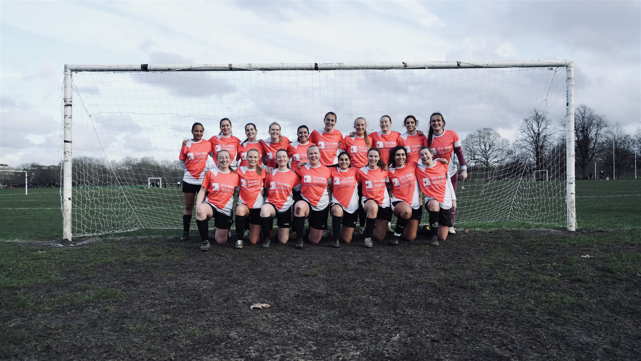 The Saints team pose together in front of the goal at the Lily's charity match