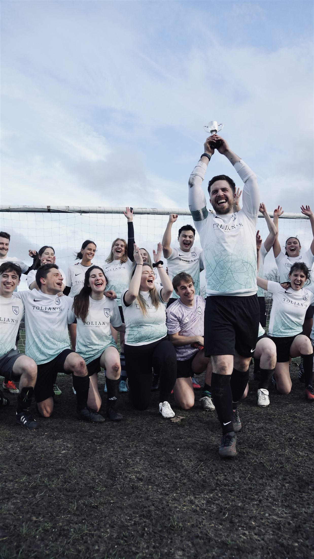 Saints and WAGs players celebrate together at the Lily's charity match