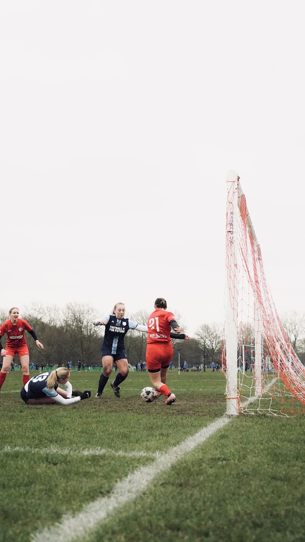 A South West Saints match in progress beside the goal